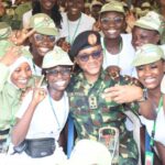 NYSC DG Brigadier General Olakunle Nafiu with corps members.