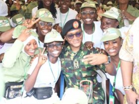 NYSC DG Brigadier General Olakunle Nafiu with corps members.